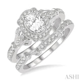 3/4 ctw Round Cut Diamond Wedding Set With 5/8 ctw Oval Cut Engagement Ring and 1/10 ctw Wedding Band in 14K White Gold