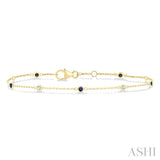 1.8 MM Sapphire and 1/10 Ctw Bezel Set Round Cut Diamond Precious Gemstone Station Bracelet in 14K Yellow Gold