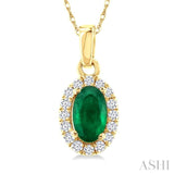 5x3 MM Oval Shape Emerald and 1/20 Ctw Single Cut Diamond Halo Precious Pendant with Chain in 10K Yellow Gold