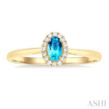 5x3 MM Oval Shape Blue Topaz and 1/20 Ctw Single Cut Diamond Halo Semi-Precious Ring in 10K Yellow Gold
