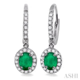 5x3 MM Oval Cut Emerald and 1/4 Ctw Round Cut Diamond Earrings in 14K White Gold