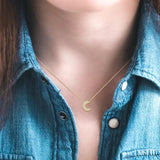 1/20 ctw Crescent Round Cut Diamond Petite Fashion Pendant With Chain in 10K Yellow Gold