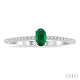 1/10 ctw Petite 5x3 MM Oval Cut Emerald and Round Cut Diamond Precious Fashion Ring in 10K White Gold