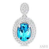 7X5 MM Oval Cut Blue Topaz and 1/20 ctw Round Cut Diamond Semi Precious Earring in Sterling Silver
