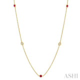 1.75 MM Ruby and 1/6 Ctw Round Cut Diamond Precious Station Necklace in 14K Yellow Gold