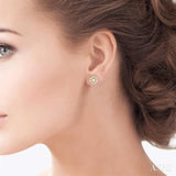 1/4 Ctw Petite Wheel Baguette and Round Cut Diamond Fashion Stud Earrings in 10K Yellow Gold