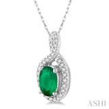 6x4 MM Oval Cut Emerald and 1/10 Ctw Round Cut Diamond Pendant in 14K White Gold with Chain