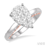 3/4 Ctw Pear Shape Lovebright Round Cut Diamond Ring in 14K White and Rose Gold